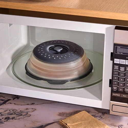 Faltbare Mikrowellenabdeckung von Pampered Chef® 30 cm 1 faltbare mikrowellenabdeckung von Pampered Chef